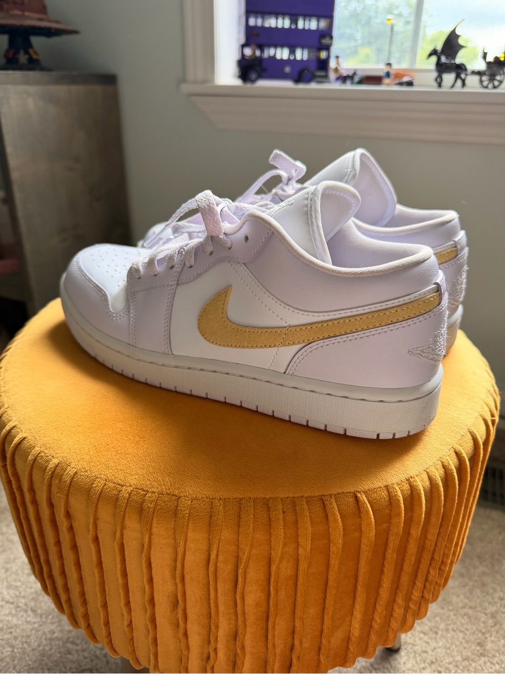 Women’s Nike Air Jordan Low-Top Purple/White Sneakers with Gold Swoosh Accent